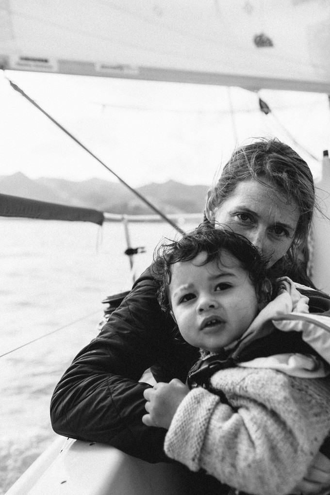 Mother and son on a sailing boat in Lyttelton Harbour